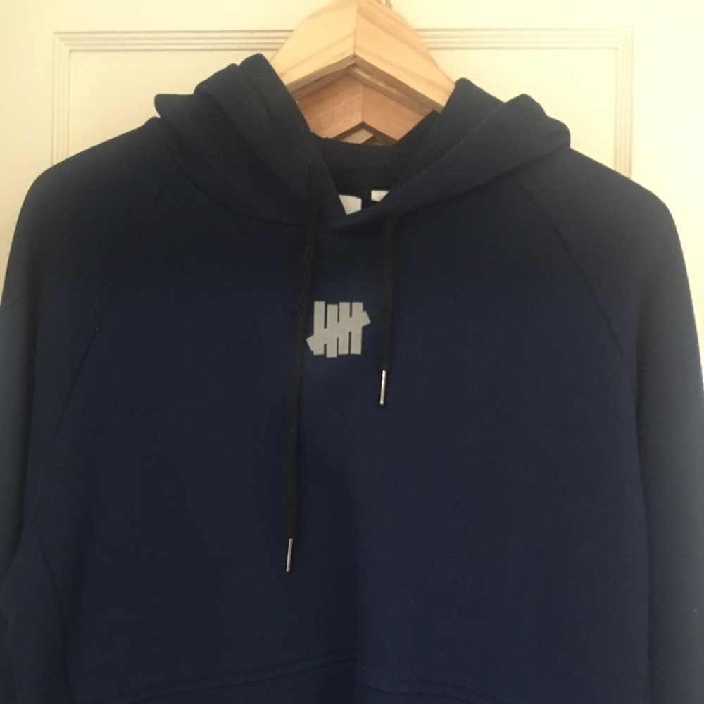 Medium Undefeated navy blue hoodie
